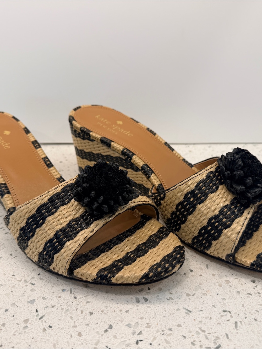 kate spade Black and Natural Striped Pom Wedge Sandals
